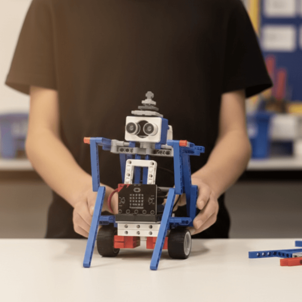 Kids solving a STEM problem together at a ThinkerLab after-school coding club in Melbourne
