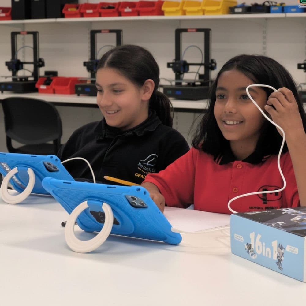 Child smiling after finishing a coding project at a ThinkerLab school holiday workshop in Melbourne’s west